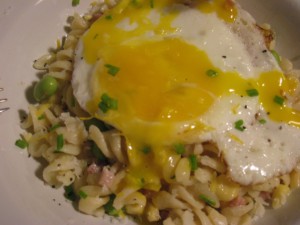 annie's organic 4 cheese pasta with pancetta, corn, edamame and an egg to top it all off
